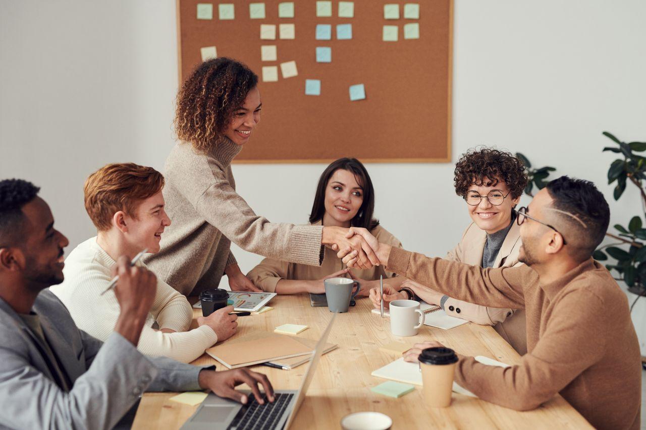 Acube and a client team aligning on a project plan