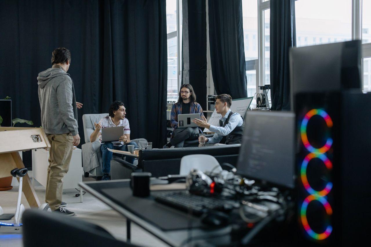 About the Company — A Decade of ERPNext & Software, Built in Kerala — indian software company team modern office, by Acube Innovations, an ERPNext & software development company in India