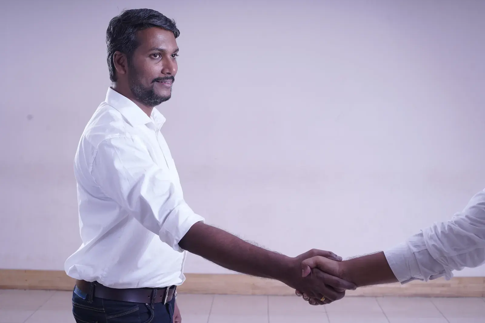A handshake closing an ERPNext engagement with Acube Innovations