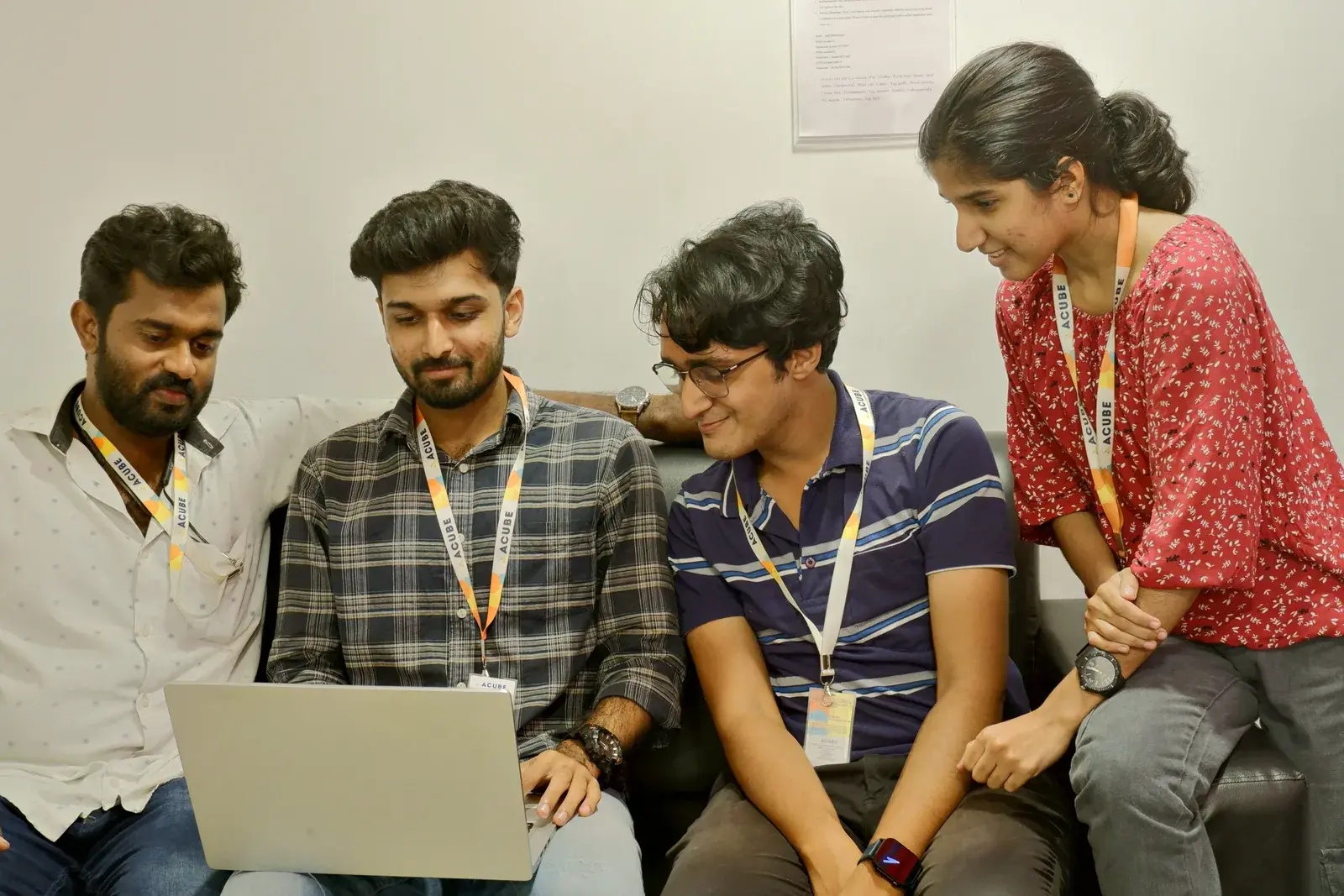 Trainees working through an ERPNext exercise together at Acube