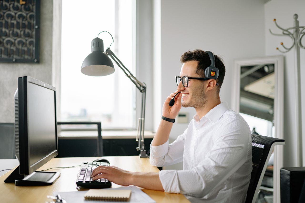 business professional phone headset call office — AI Voice Bots & Smart IVR — In Your Customers' Language delivered by Acube Innovations (ERPNext, AI & software, India)