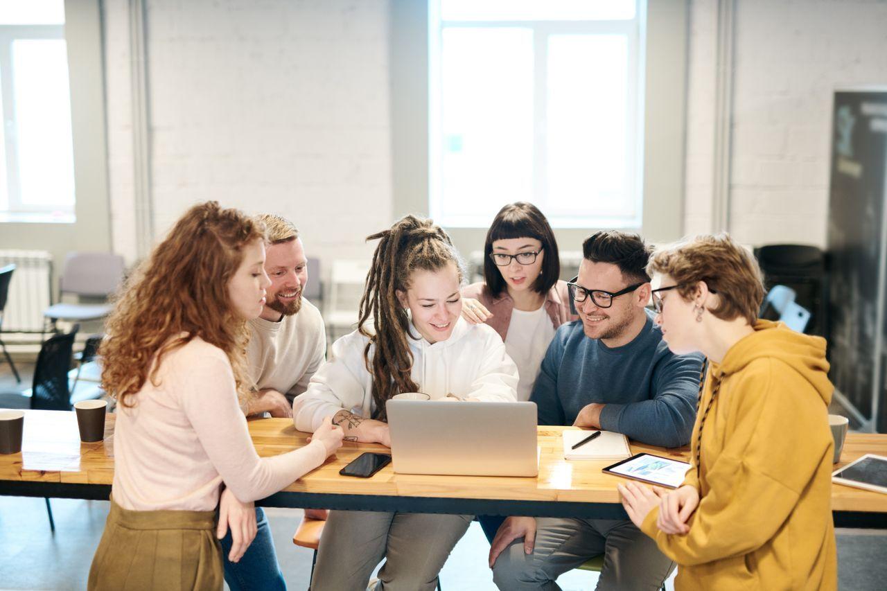 Careers at Acube Innovations — Build ERPNext & Digital Solutions in Kochi — happy developers working together office, by Acube Innovations, an ERPNext & software development company in India