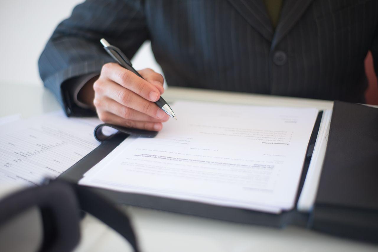 Company Information — Acube Innovations Private Limited — business documents signing paperwork office desk, by Acube Innovations, an ERPNext & software development company in India