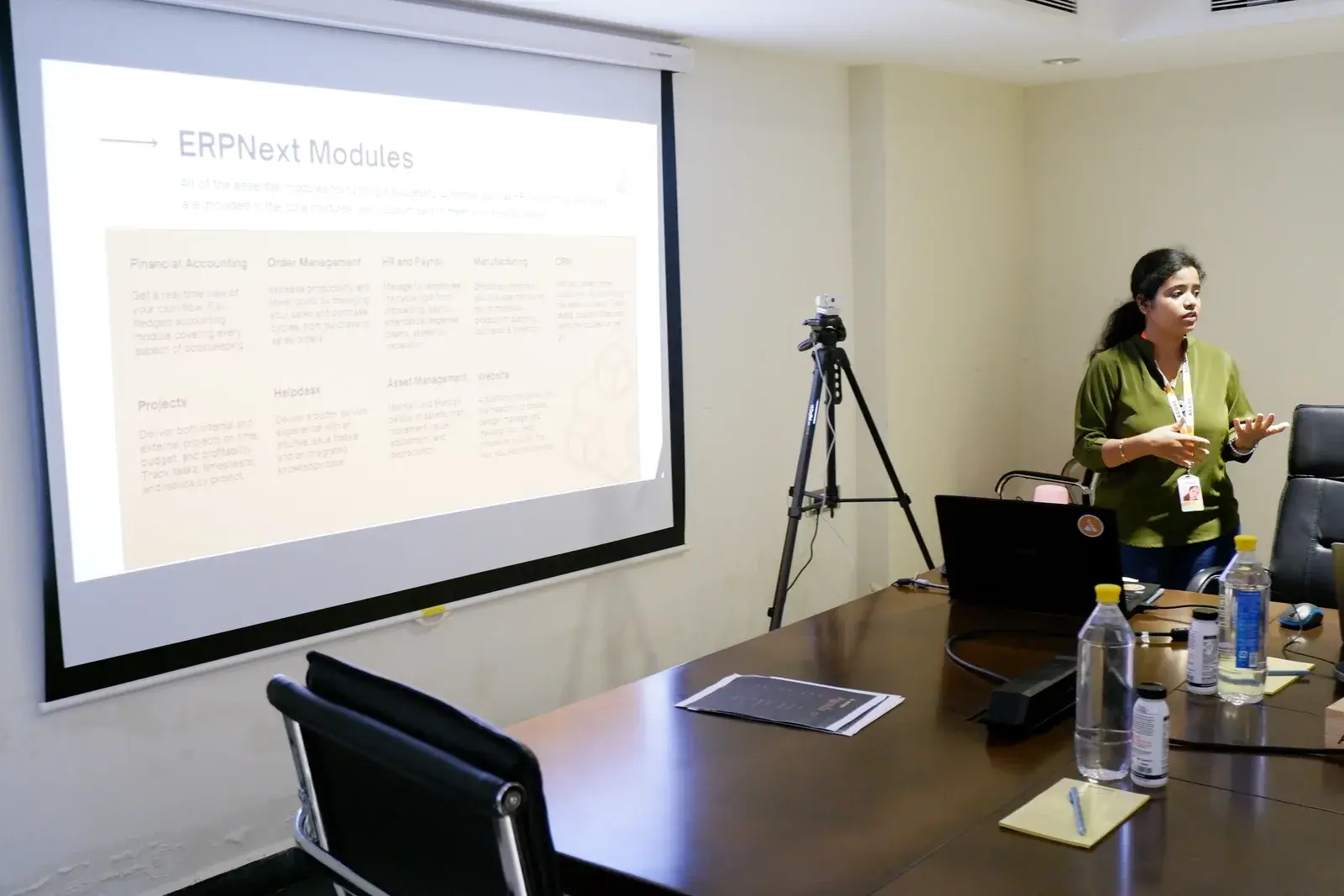 Acube walking a client through the ERPNext module map during implementation