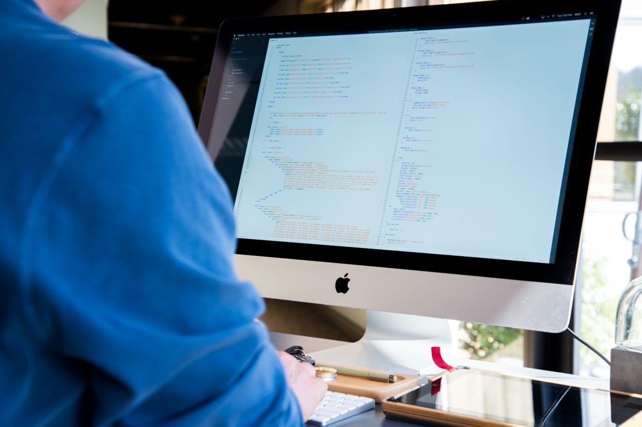 Junior ERPNext Developer — Kochi | Acube Innovations — junior developer programming computer screen, by Acube Innovations, an ERPNext & software development company in India