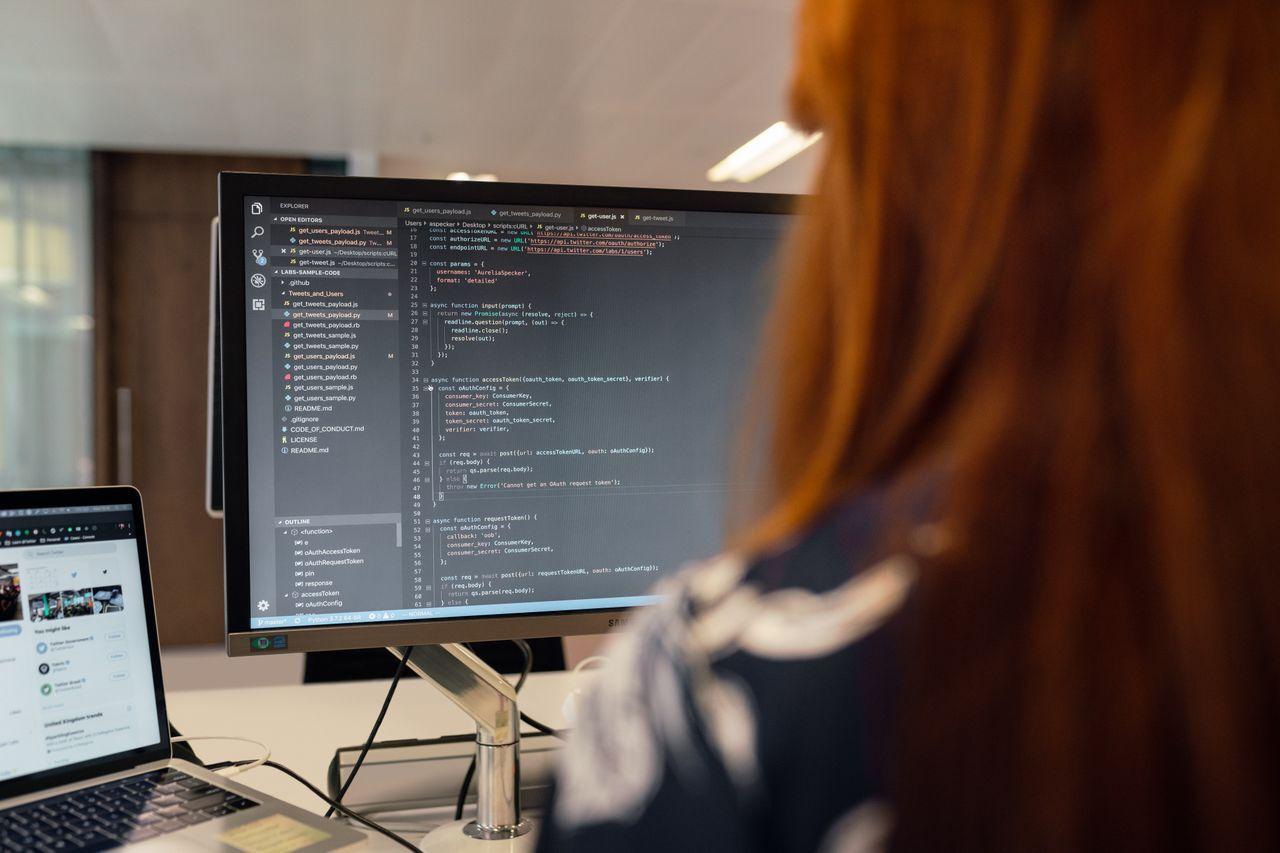 junior developer programming computer screen — Junior ERPNext Developer — Kochi | Acube Innovations delivered by Acube Innovations (ERPNext, AI & software, India)