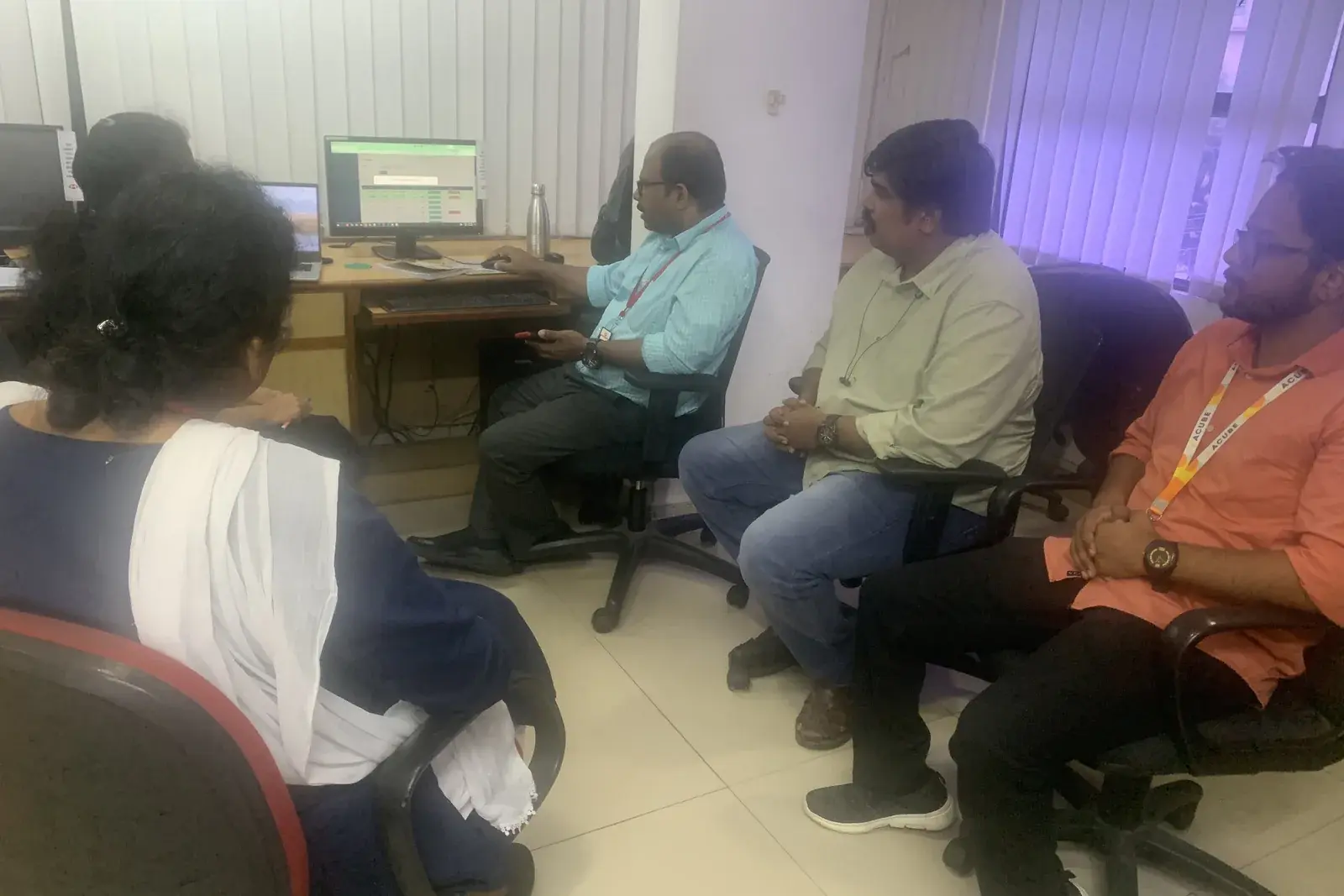 Acube running an on-site session for the Muthoot Securities mScan rollout