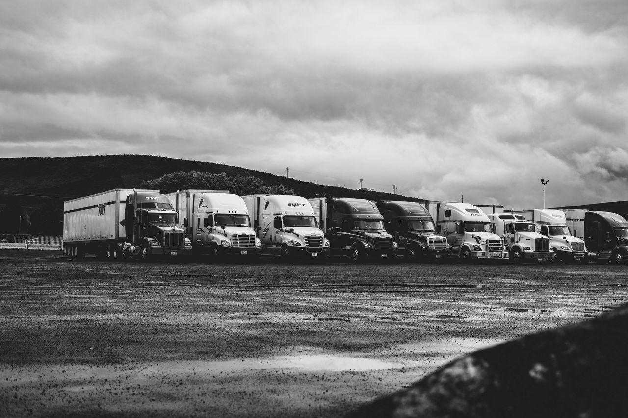 truck logistics fleet highway transport — Red Lines International — ERPNext Cut Empty Running 80% Across a GCC Fleet delivered by Acube Innovations (ERPNext, AI & software, India)