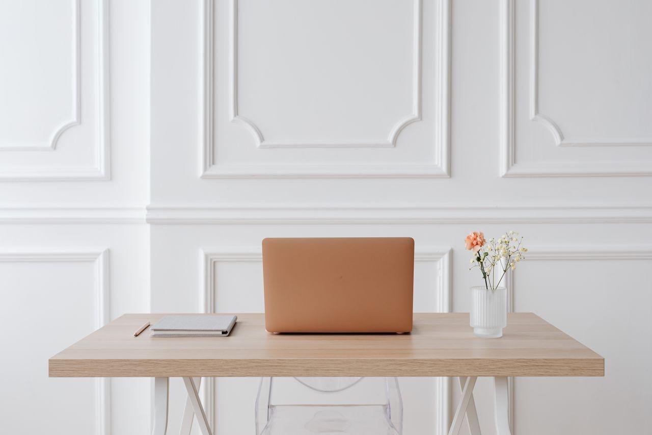 Simplicity Delivered — The Heartbeat of Acube Innovations — clean minimal workspace laptop desk, by Acube Innovations, an ERPNext & software development company in India