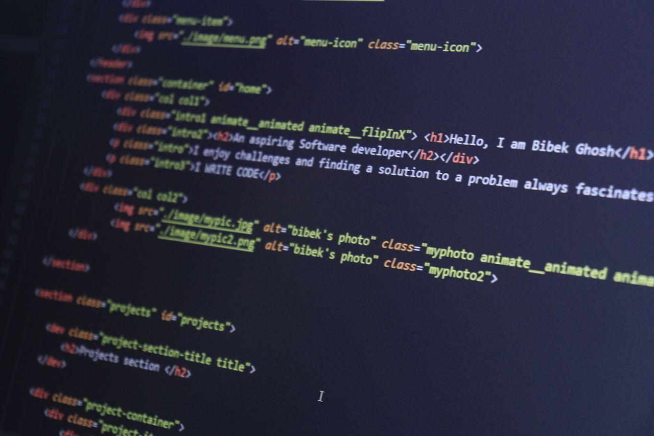 Web Development Company — Websites & Web Apps Built to Grow Your Business — web developer coding website screen, by Acube Innovations, an ERPNext & software development company in India