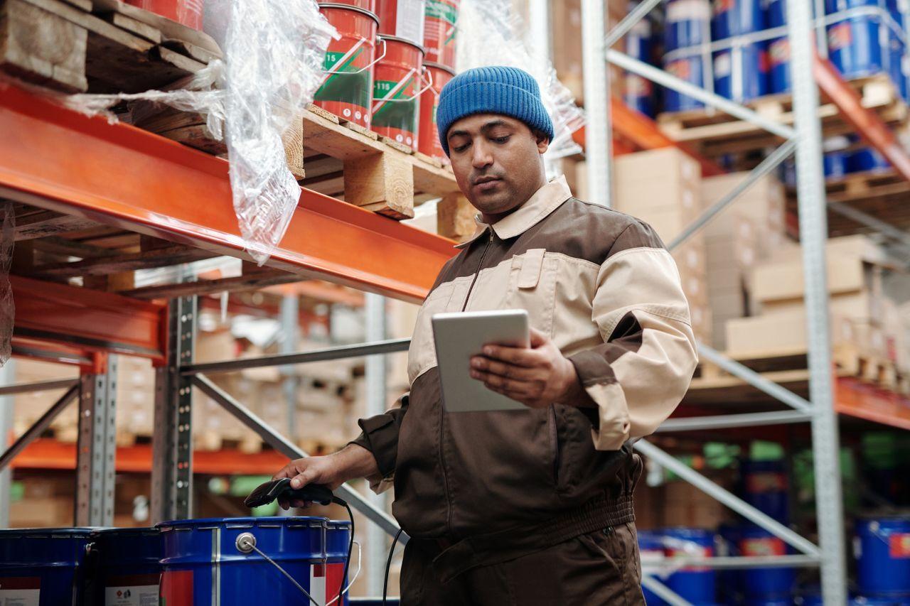 electronics warehouse boxes inventory scanning — Multi-branch stock, with every handset accounted for by IMEI delivered by Acube Innovations (ERPNext, AI & software, India)