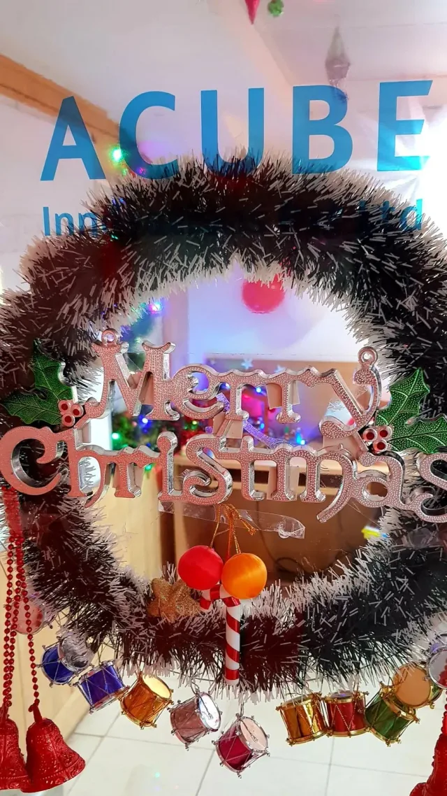 A Merry Christmas wreath at the Acube office