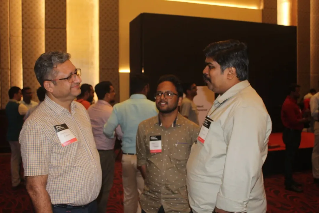 Conference delegates talking at the ERPNext Conference 2022