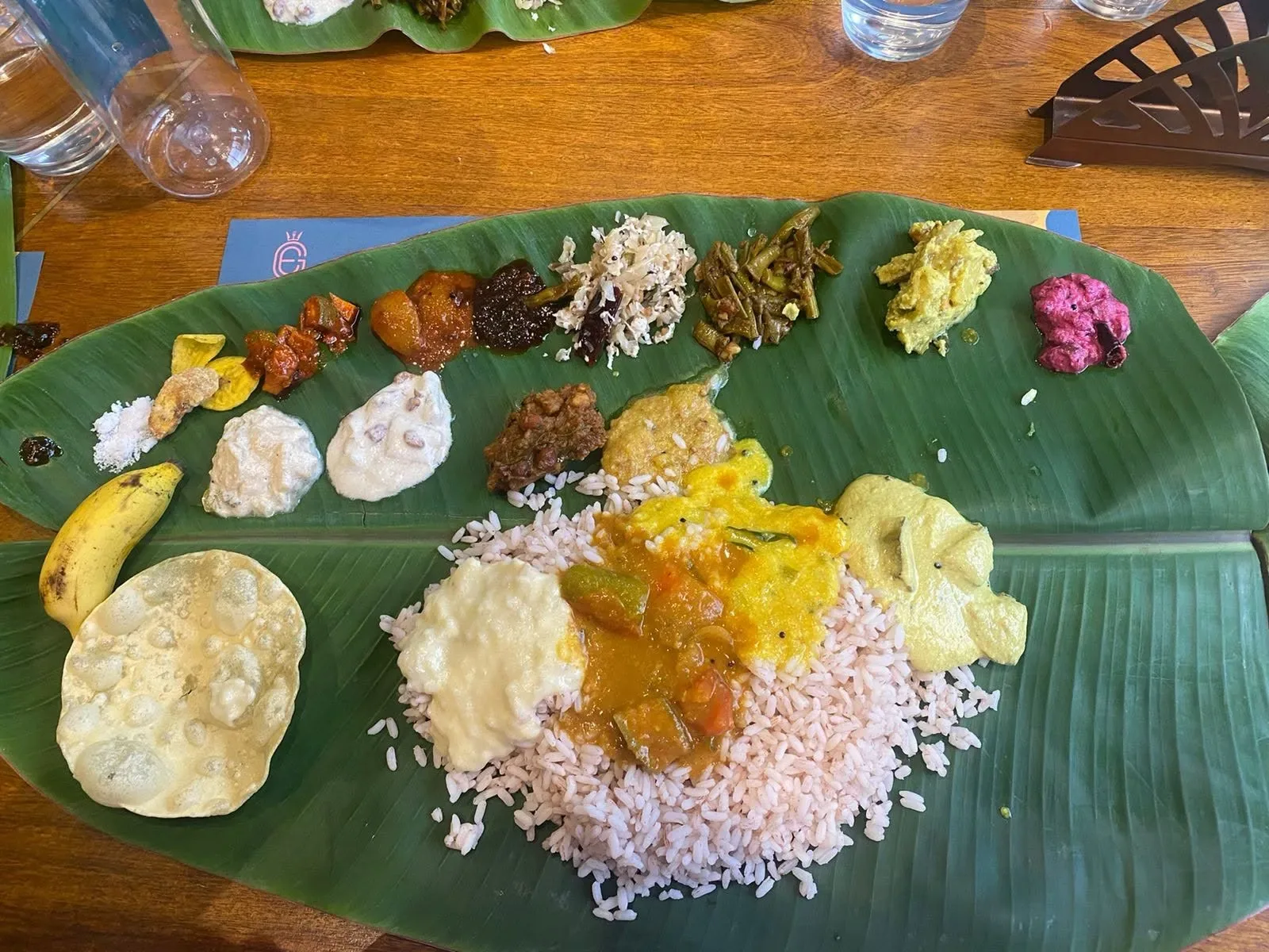 An Onasadhya served on a banana leaf