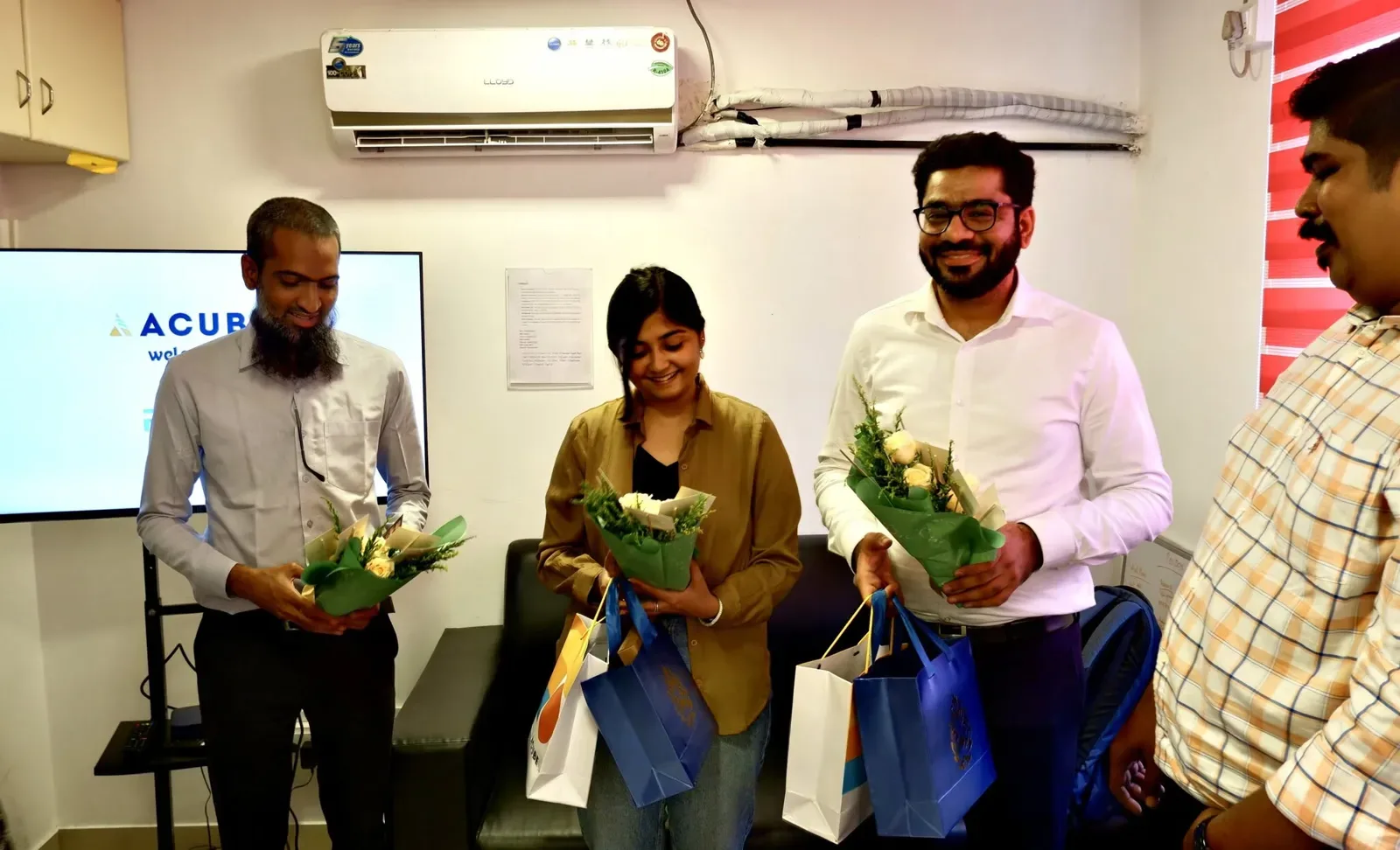 The Frappe delegation welcomed with flowers at the Acube office